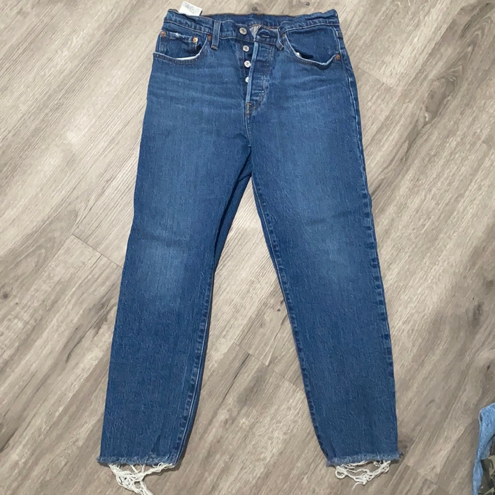 Levi’s 501 high rise button up fly.